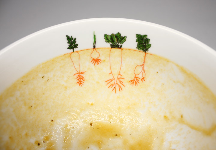 Illustrations showing the cross section of rooted vegetables were silk screened on the insides of the bowls to solve the issue of keeping soup portions consistent.